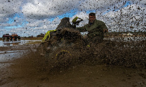 Watch: NFL Receiver Jumps Into the Mud to Help a Stranger in Need